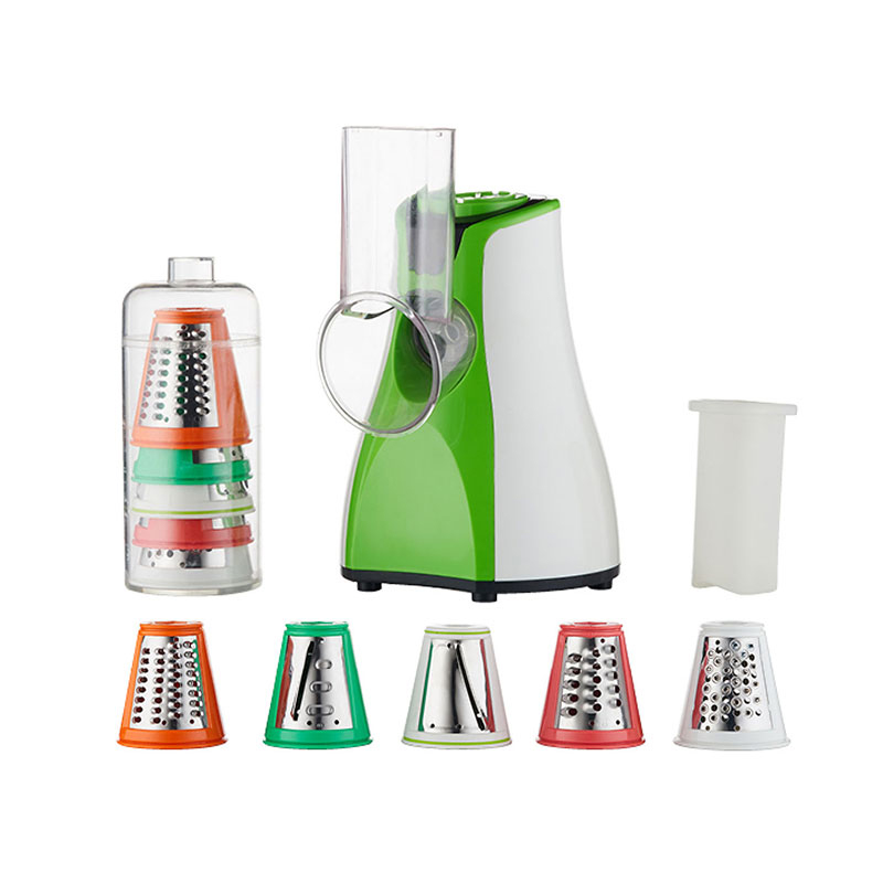 What precautions should be taken when using a manual vegetable slicer to avoid accidents or injuries?
